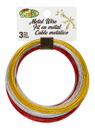 Cable metálico dorado, plateado y rojo sobre fondo blanco