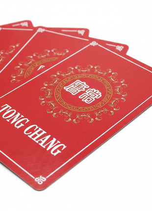 Baraja de Cartas Casino Tong Chang, clásico para familias acogedoras en una reunión.