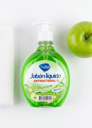 Jabón líquido de manzana en vista cenital