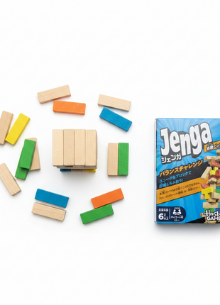 Jenga Balance Challenge flat lay bloques madera colores amarillo verde azul naranja