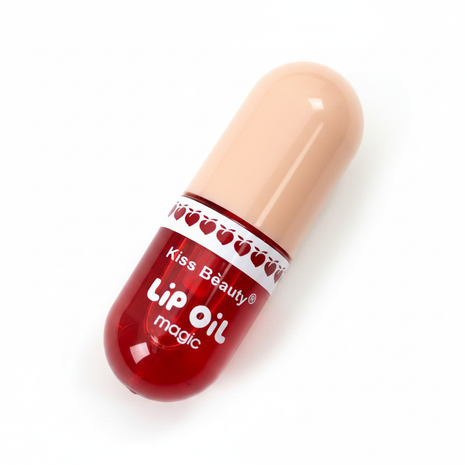 Kiss Beauty Lip Oil – cápsula roja translúcida – aceite labial brillante – diseño único en forma de píldora