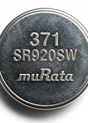 Murata SR920SW 371 – detalle de grabado y superficie metálica – pila botón de óxido de plata 1.55V

