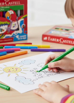 Niño usando plumones Faber-Castell Fiesta 12 colores lavables