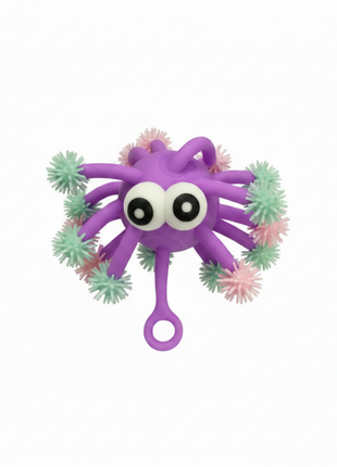Pulpo puffer sensorial lila morado tentáculos pastel ojos grandes antiestrés