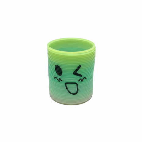 Resorte mágico juguete pequeño verde kawaii slinky plástico sensorial niños divertido
