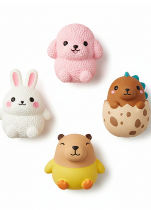 Squishies flat lay - colección 5 animales kawaii: Poodle, Conejo, Dino, Pollito y Capibara slow-rise foam
