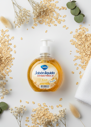 Tópico jabón líquido antibacterial avena 1L – flat lay con granos de avena – fórmula hidratante natural