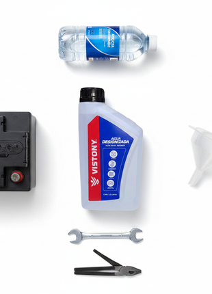 Agua desionizada Vistony 1.1L con accesorios de mantenimiento automotriz — vista cenital

